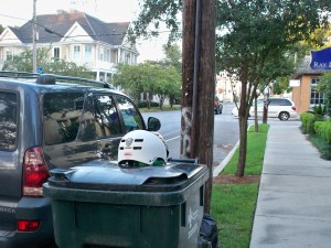 Bike Helmet in the Trash at Magazine and Philip