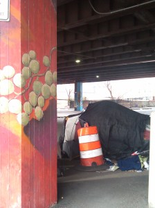 Tent and Safety Barrel Under the JFX at Gay & Fallsway